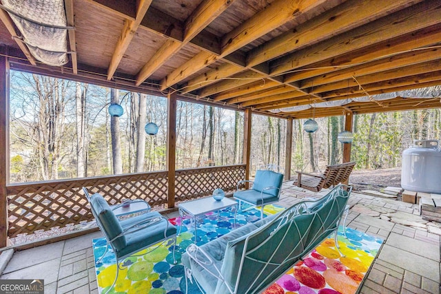 sunroom featuring plenty of natural light