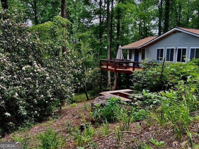 view of yard featuring a deck