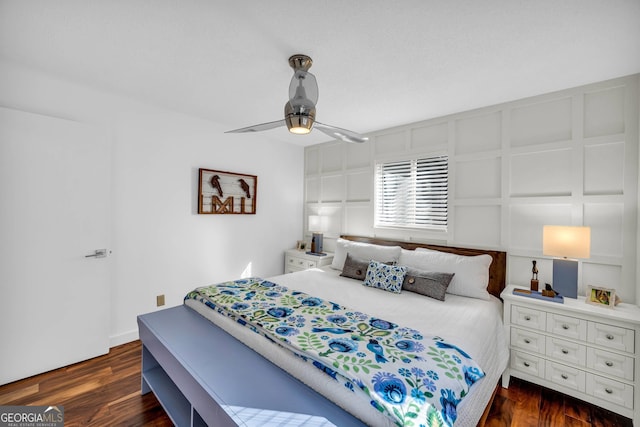 153 Coleman Heights Ln, Rabun Gap, GA 30568 - bedroom with dark wood finished floors and ceiling fan