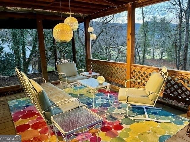 153 Coleman Heights Ln, Rabun Gap, GA 30568 - sunroom / solarium featuring plenty of natural light