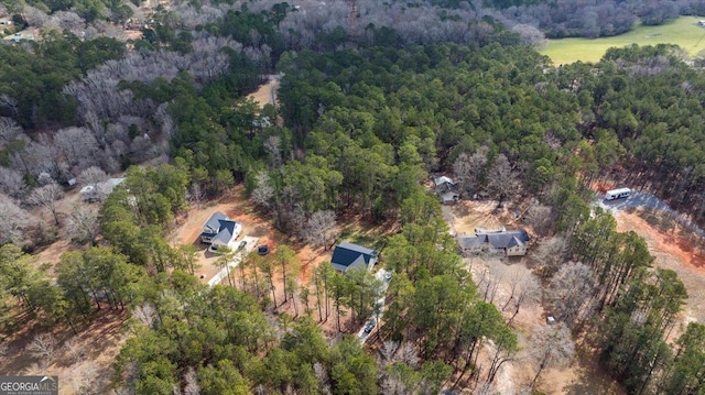 drone / aerial view with a view of trees