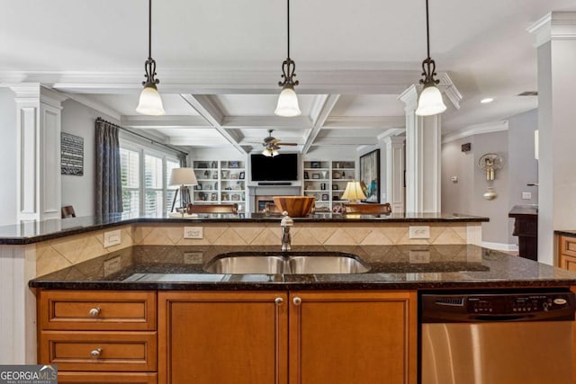 kitchen with decorative light fixtures, decorative columns, stainless steel dishwasher, a sink, and coffered ceiling