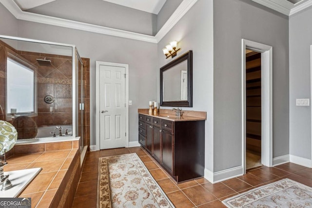 full bathroom featuring a stall shower, baseboards, ornamental molding, and tile patterned floors