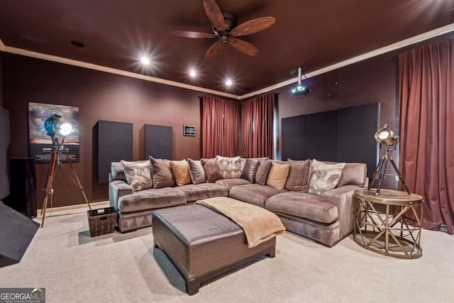 home theater room featuring ceiling fan, ornamental molding, carpet flooring, and recessed lighting