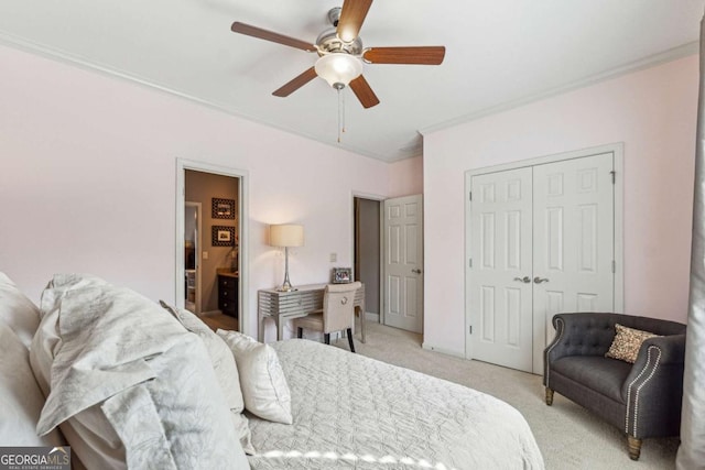 bedroom featuring ceiling fan, light colored carpet, baseboards, ornamental molding, and a closet