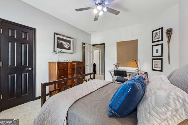 carpeted bedroom featuring ceiling fan