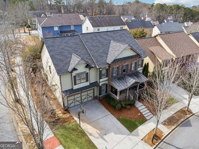 drone / aerial view with a residential view