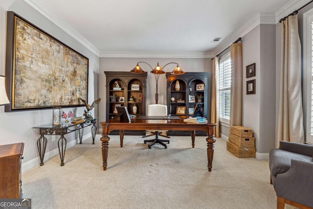 carpeted office with baseboards, visible vents, and crown molding