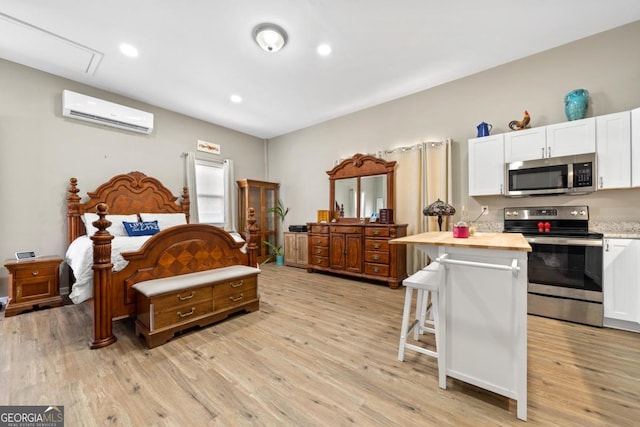 bedroom featuring a wall unit AC, light wood-type flooring, and recessed lighting