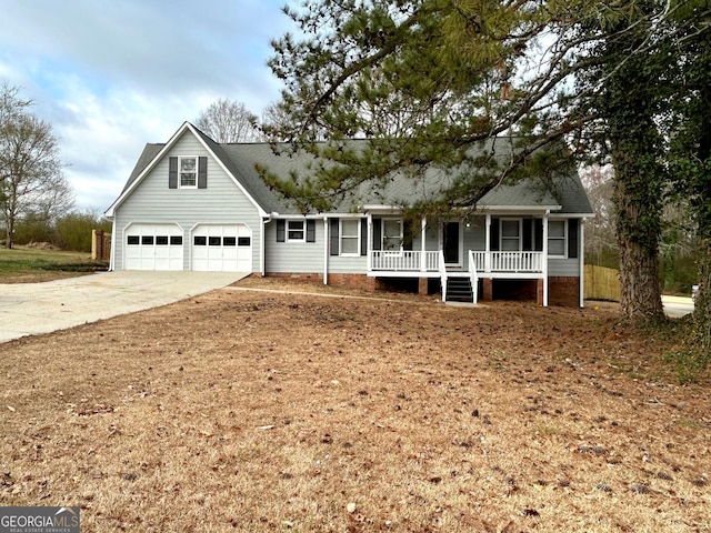 view of front facade with a porch and concrete driveway