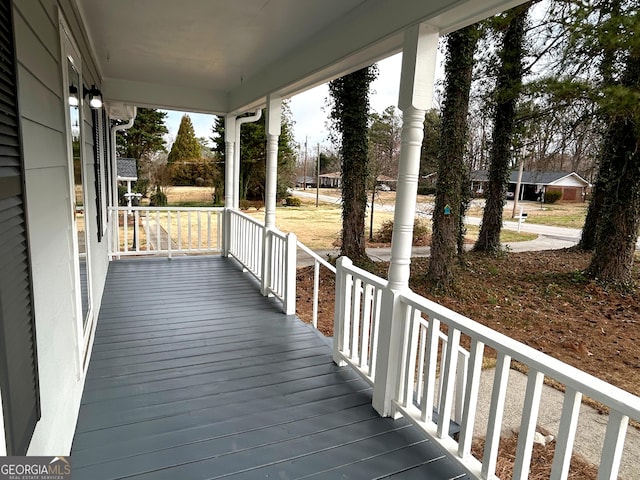 deck with covered porch