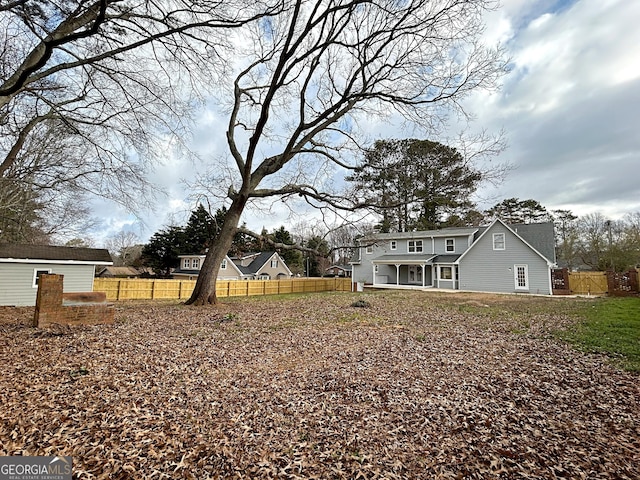 view of yard with fence