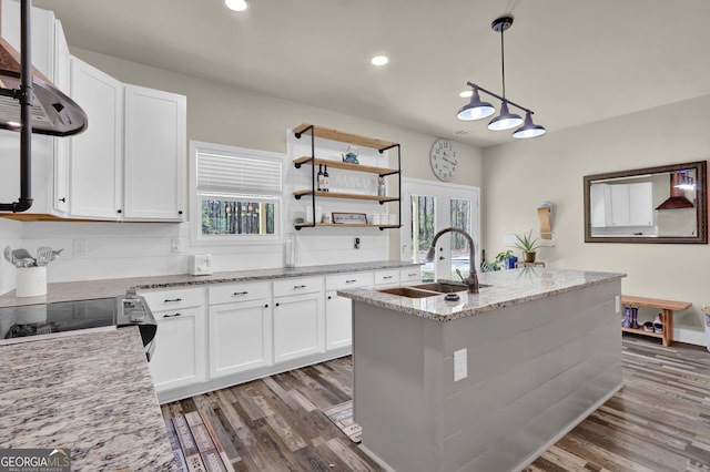 90 Jefferson Rd, Statham, GA 30666 - kitchen with white cabinetry, wood finished floors, and a sink