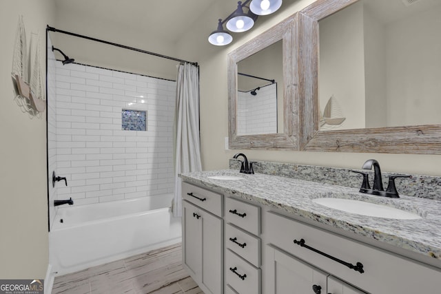 90 Jefferson Rd, Statham, GA 30666 - full bath with double vanity, shower / bath combo with shower curtain, and a sink