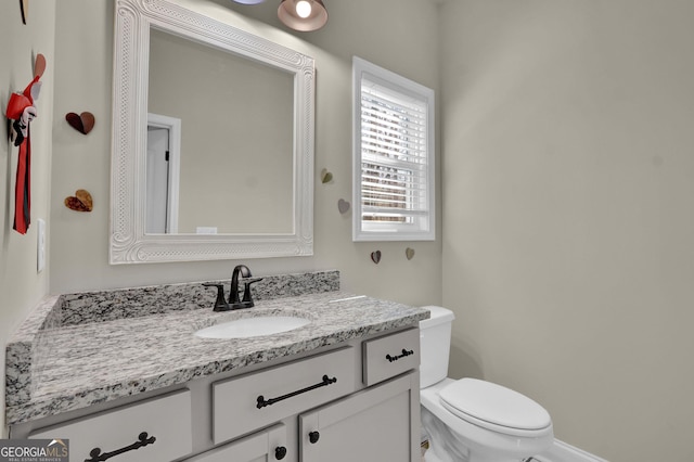 90 Jefferson Rd, Statham, GA 30666 - half bathroom featuring vanity and toilet