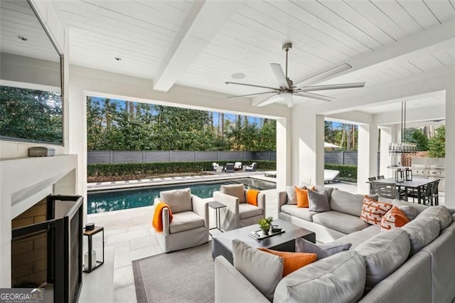 view of patio / terrace featuring outdoor dining space, a ceiling fan, a fenced in pool, an outdoor living space, and a fenced backyard