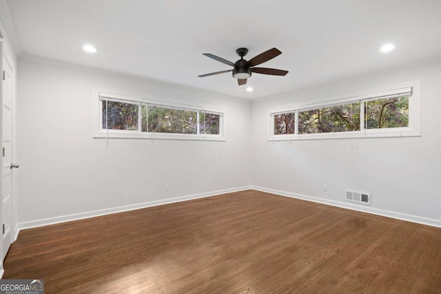 unfurnished room featuring recessed lighting, visible vents, baseboards, and wood finished floors