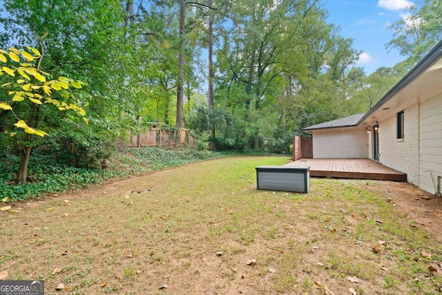 view of yard with a deck