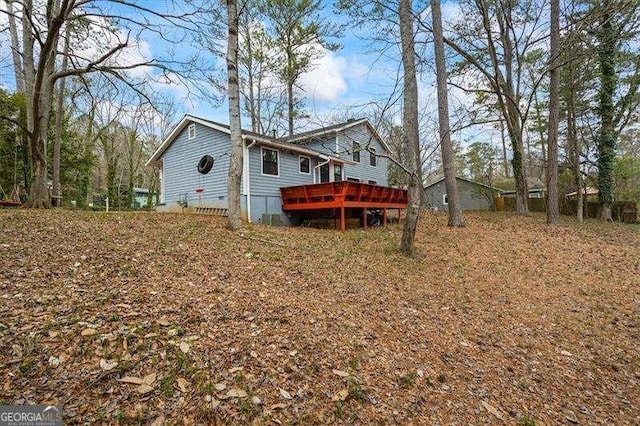 exterior space featuring crawl space and a wooden deck