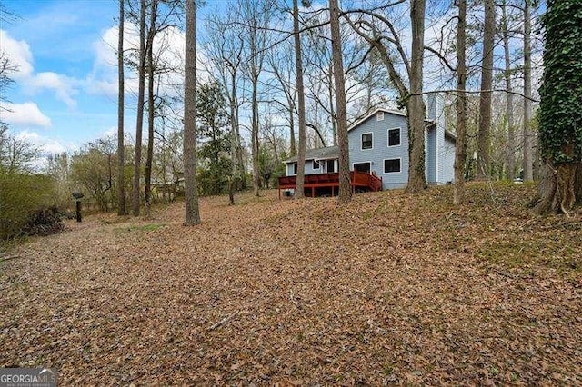 view of yard featuring a deck