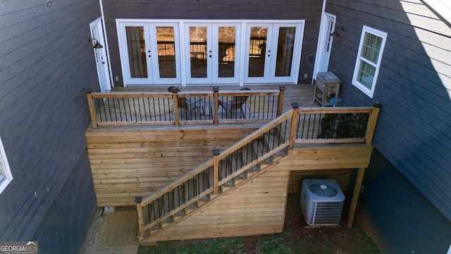 wooden terrace featuring french doors and central AC