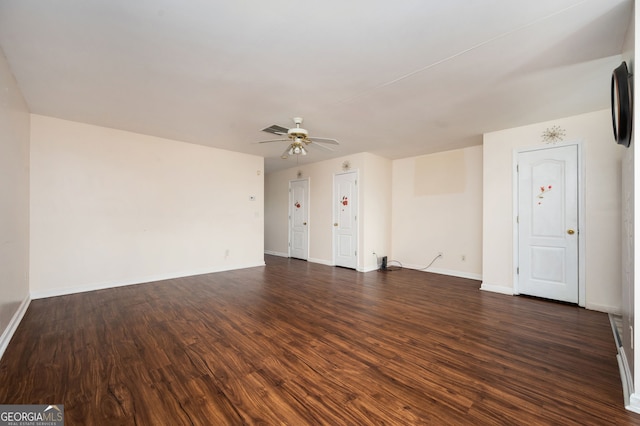 unfurnished living room featuring visible vents, baseboards, ceiling fan, and dark wood finished floors