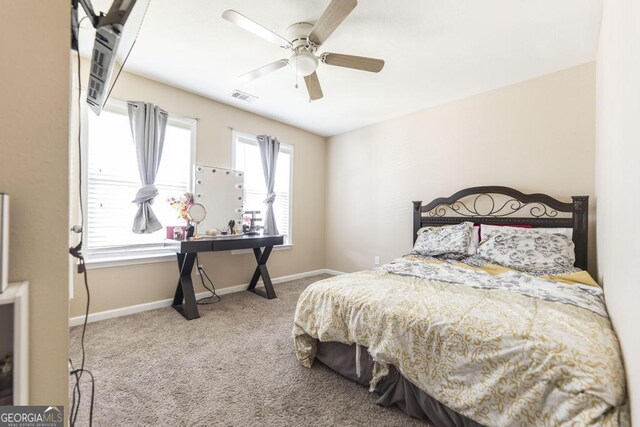 141 Back Cedar Ln, Warner Robins, GA 31093 - bedroom featuring carpet floors, ceiling fan, and baseboards