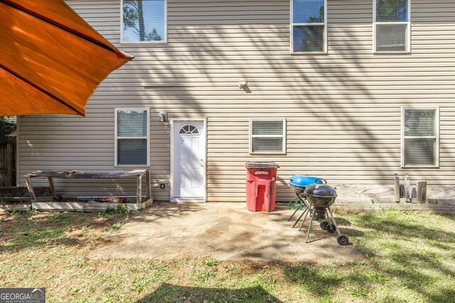 141 Back Cedar Ln, Warner Robins, GA 31093 - property entrance with a patio area and a hot tub