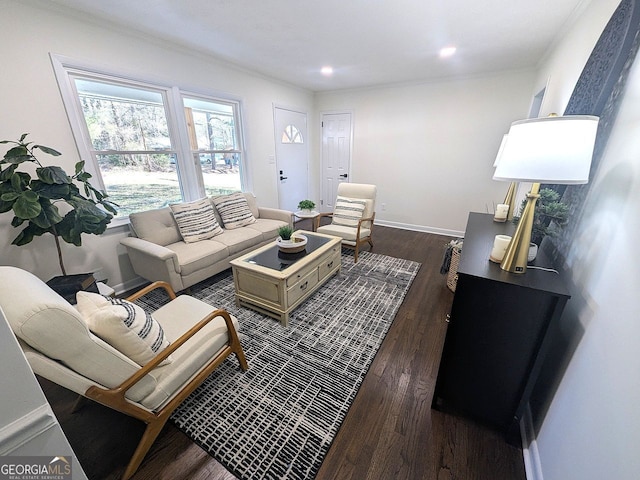 living room with baseboards, ornamental molding, dark wood-type flooring, and recessed lighting
