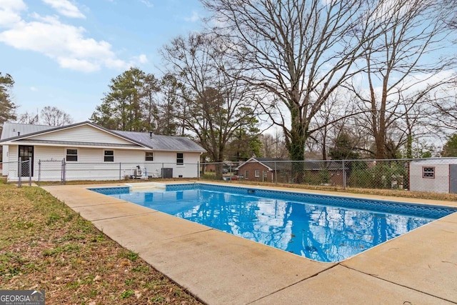 view of swimming pool with fence, a patio area, and a fenced in pool