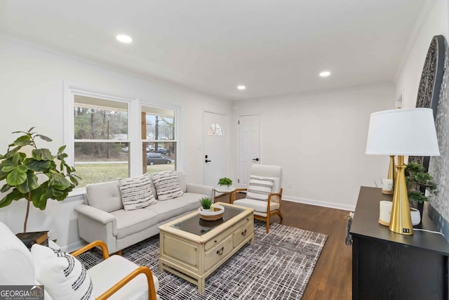 living room featuring dark wood finished floors, baseboards, and recessed lighting