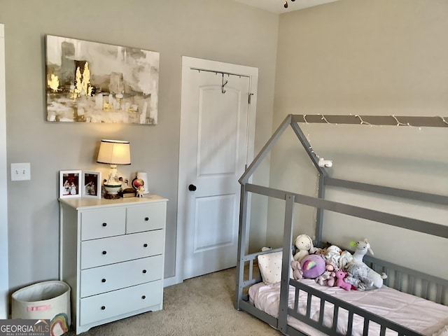 bedroom featuring light colored carpet