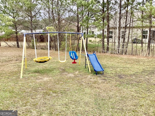 view of playground featuring a yard