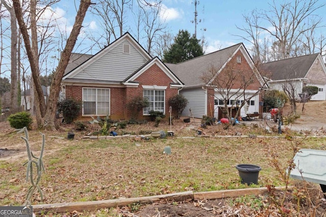 ranch-style home with brick siding