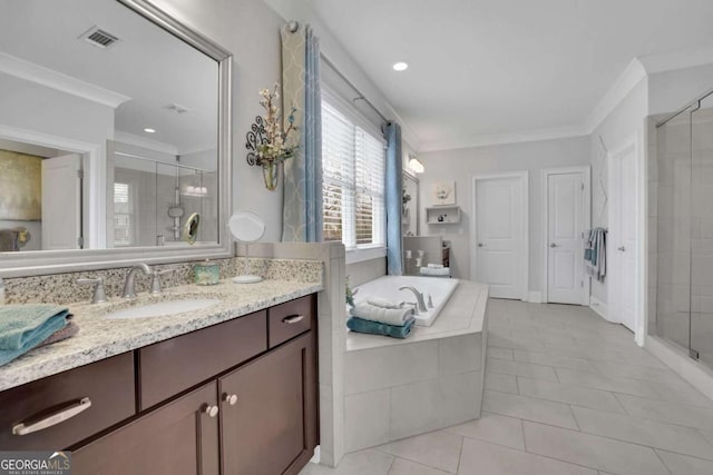 full bathroom with visible vents, crown molding, vanity, tile patterned floors, and a stall shower