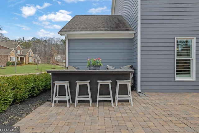 view of patio featuring outdoor dry bar