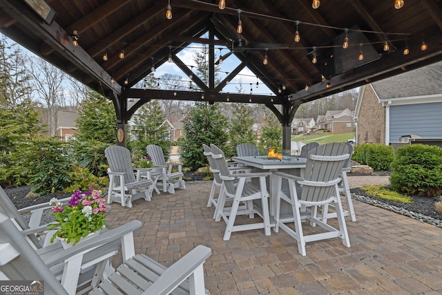 view of patio / terrace with a gazebo and an outdoor fire pit