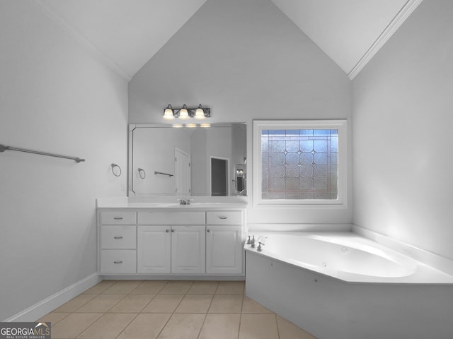 full bath with a garden tub, lofted ceiling, vanity, tile patterned flooring, and baseboards