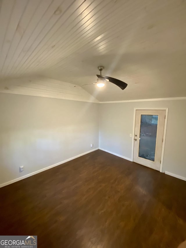 spare room with wood ceiling, ceiling fan, dark wood finished floors, and baseboards
