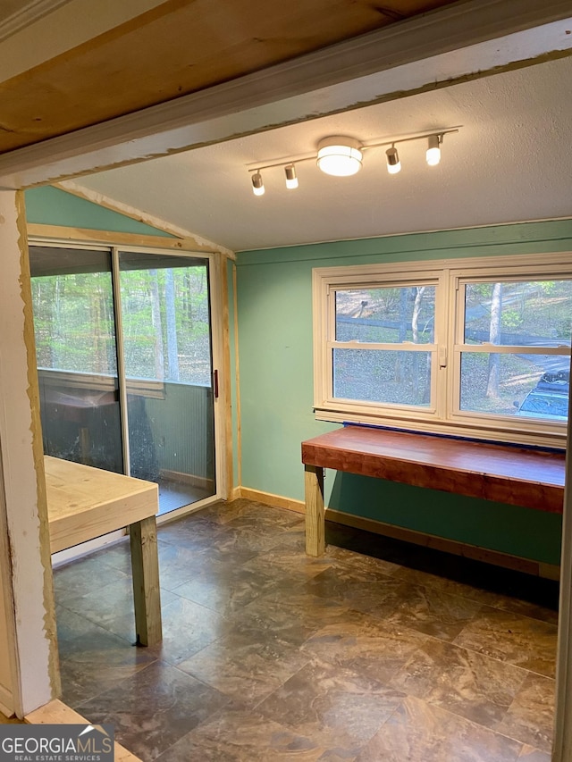 miscellaneous room with baseboards