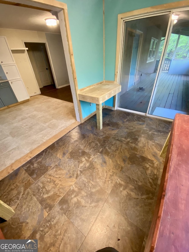 interior space with baseboards
