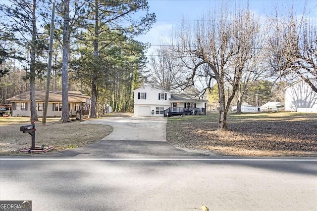 tri-level home featuring driveway