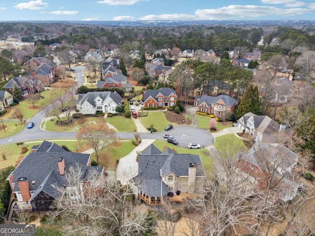 birds eye view of property with a residential view