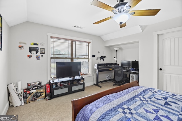 bedroom featuring baseboards, visible vents, a ceiling fan, vaulted ceiling, and carpet flooring