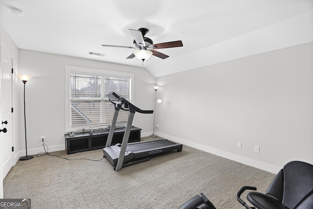 workout room featuring carpet, visible vents, vaulted ceiling, ceiling fan, and baseboards