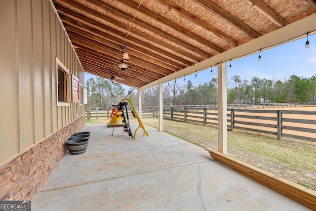 view of patio / terrace featuring ceiling fan