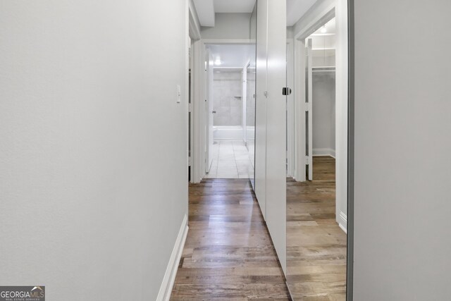 620 Peachtree St Unit 503, Atlanta, GA 30308 - hall featuring baseboards and light wood finished floors