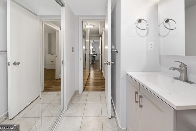 620 Peachtree St Unit 503, Atlanta, GA 30308 - bathroom with tile patterned flooring, baseboards, and vanity