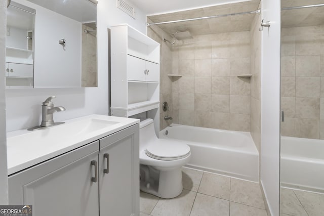 620 Peachtree St Unit 503, Atlanta, GA 30308 - bathroom featuring visible vents, toilet, tile patterned floors, vanity, and shower / washtub combination