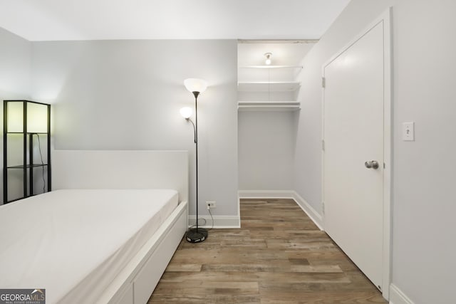 620 Peachtree St Unit 503, Atlanta, GA 30308 - bedroom with wood finished floors and baseboards